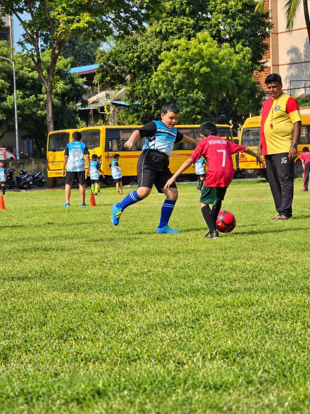 North Point School students playing football on the school grounds
