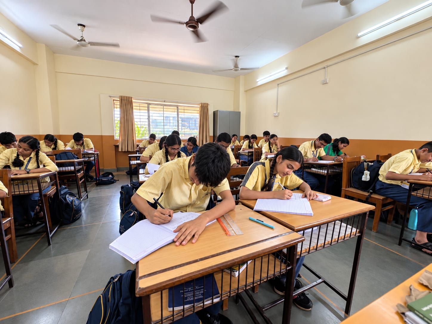 North Point School Secondary students writing at their desks in class